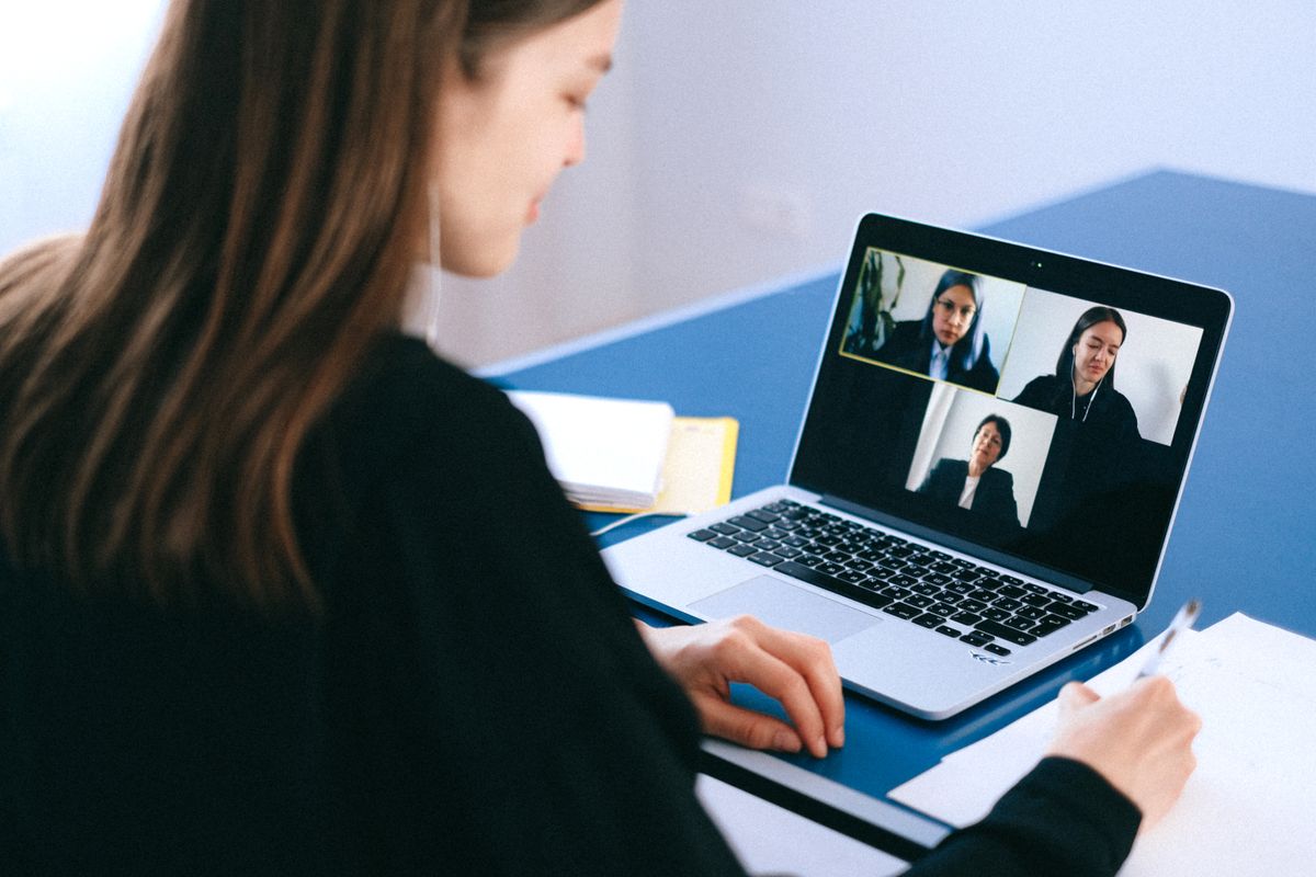 Colleagues working at a shared desk